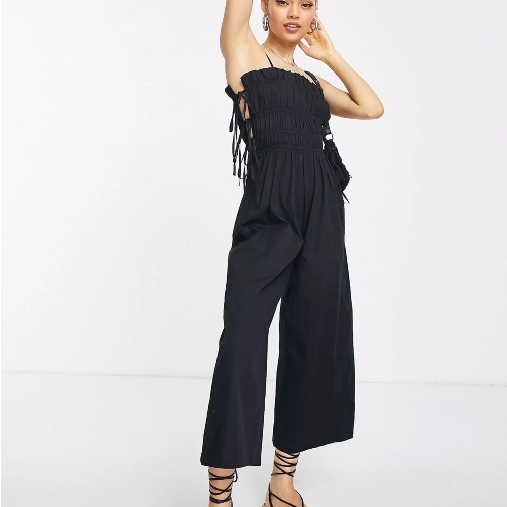 ASOS DESIGN Petite shirred strappy jumpsuit